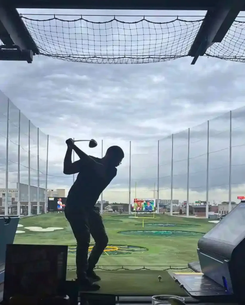 man swinging a golf club