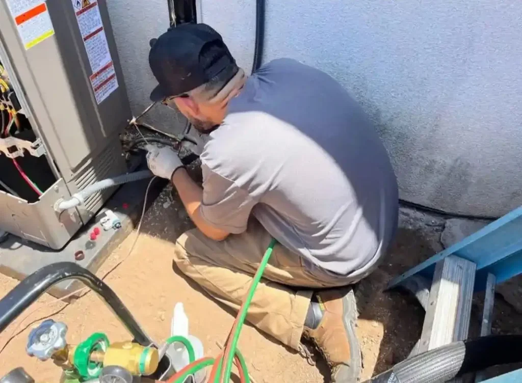 HVAC project manager brazing and outdoor AC condenser