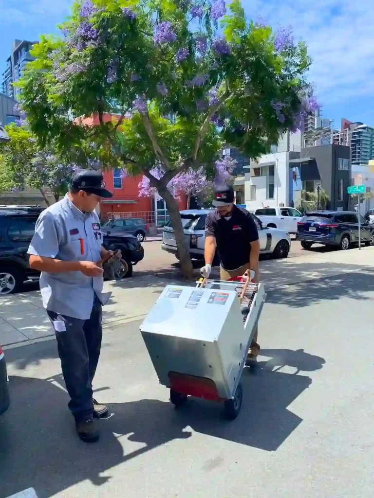 HVAC project manager and technician outside